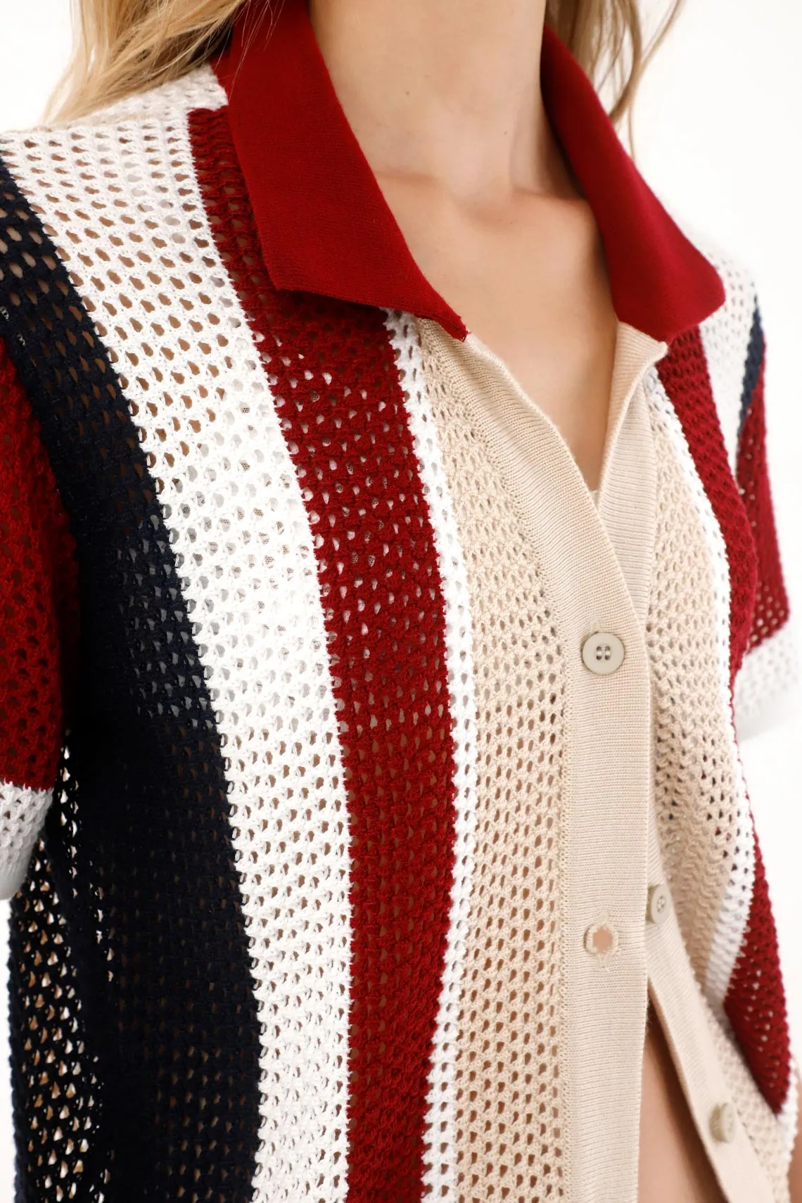 Women's cream knit shirt with striped design
